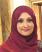 Headshot of Asmut, wearing a red headscarf